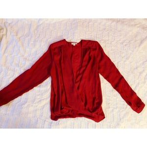 Burgundy long sleeve shirt opened from the front
